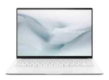 Front view of ASUS Zenbook S14 UX5406 in Scandinavian White with open display